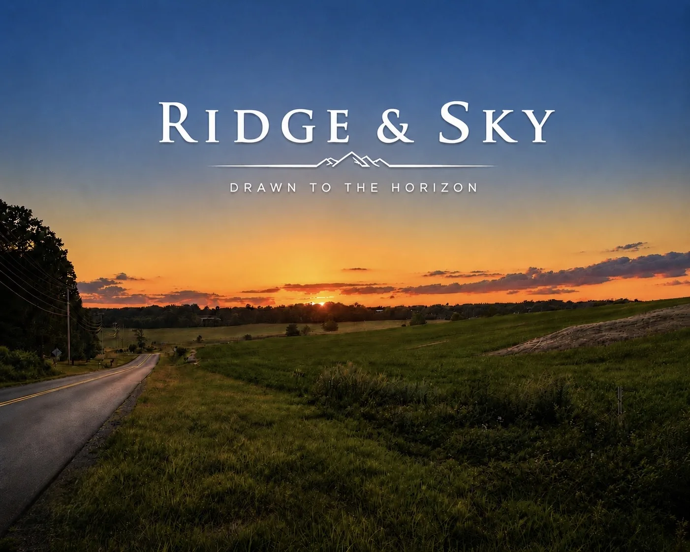 Layered mountain ridges beneath an open sky